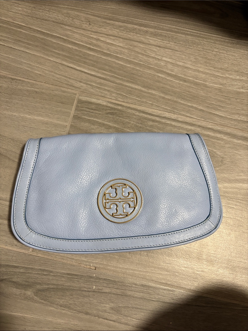 Light Blue Leather Clutch with Gold Logo Accent